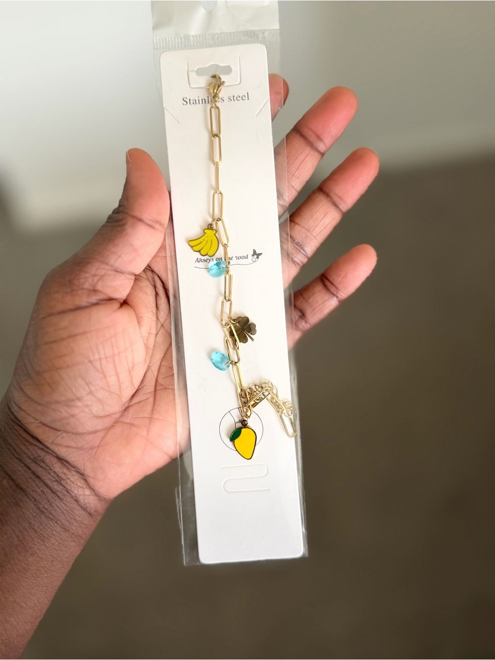 Gold Link Charm Bracelet with Yellow & Blue Accents